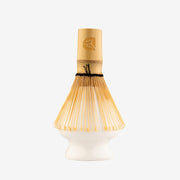 White ceramic matcha holder for matcha bamboo whisk.