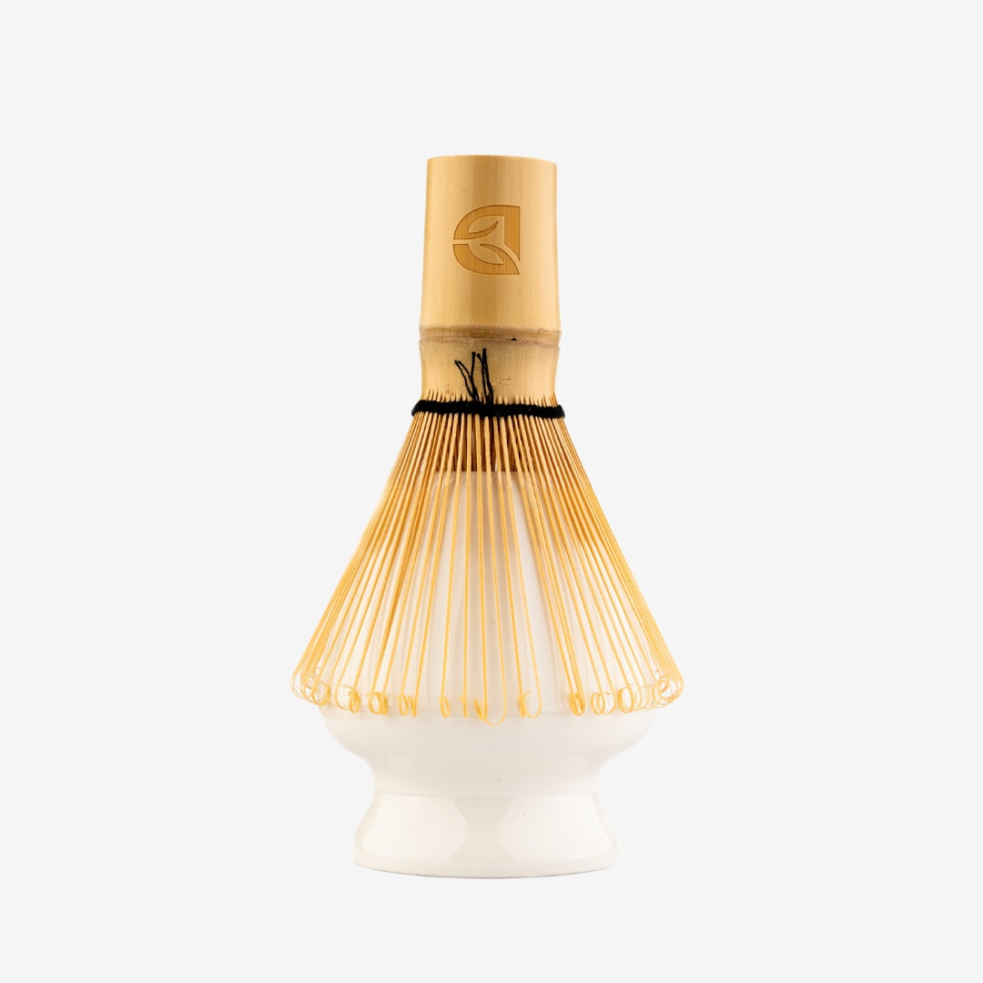 White ceramic matcha holder for matcha bamboo whisk. 