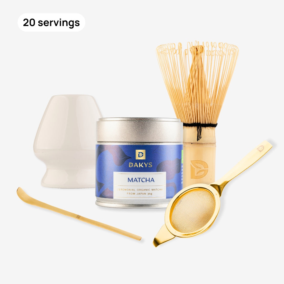 Complete Dakys Matcha ritual set including organic ceremonial Performance Matcha, bamboo whisk, ceramic holder for a whisk, matcha sifter, and bamboo scoop — all you need for the perfect preparation.
